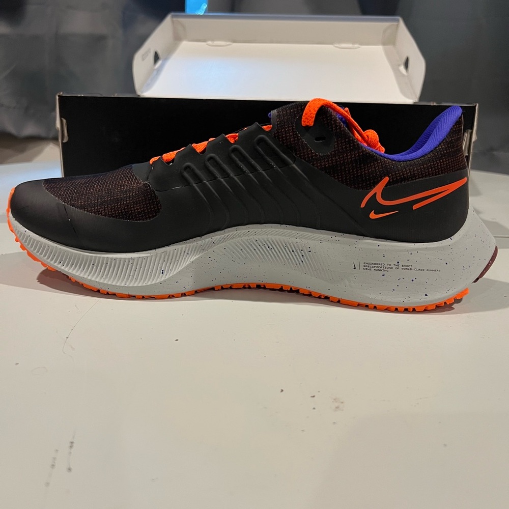 Nike Air Zoom Pegasus 38 Shield in Black and Orange